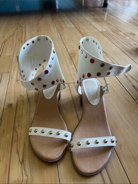 Wild Diva White Ankle-Strap Stud Sandals with Red & Gold Accents
